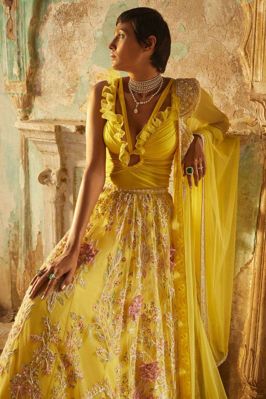 Yellow embroidered lehenga a ruffled bodysuit