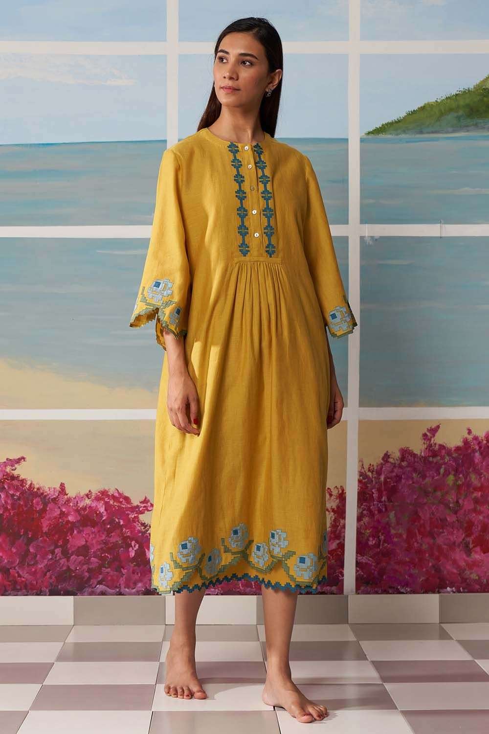 Mustard dress with floral applique details