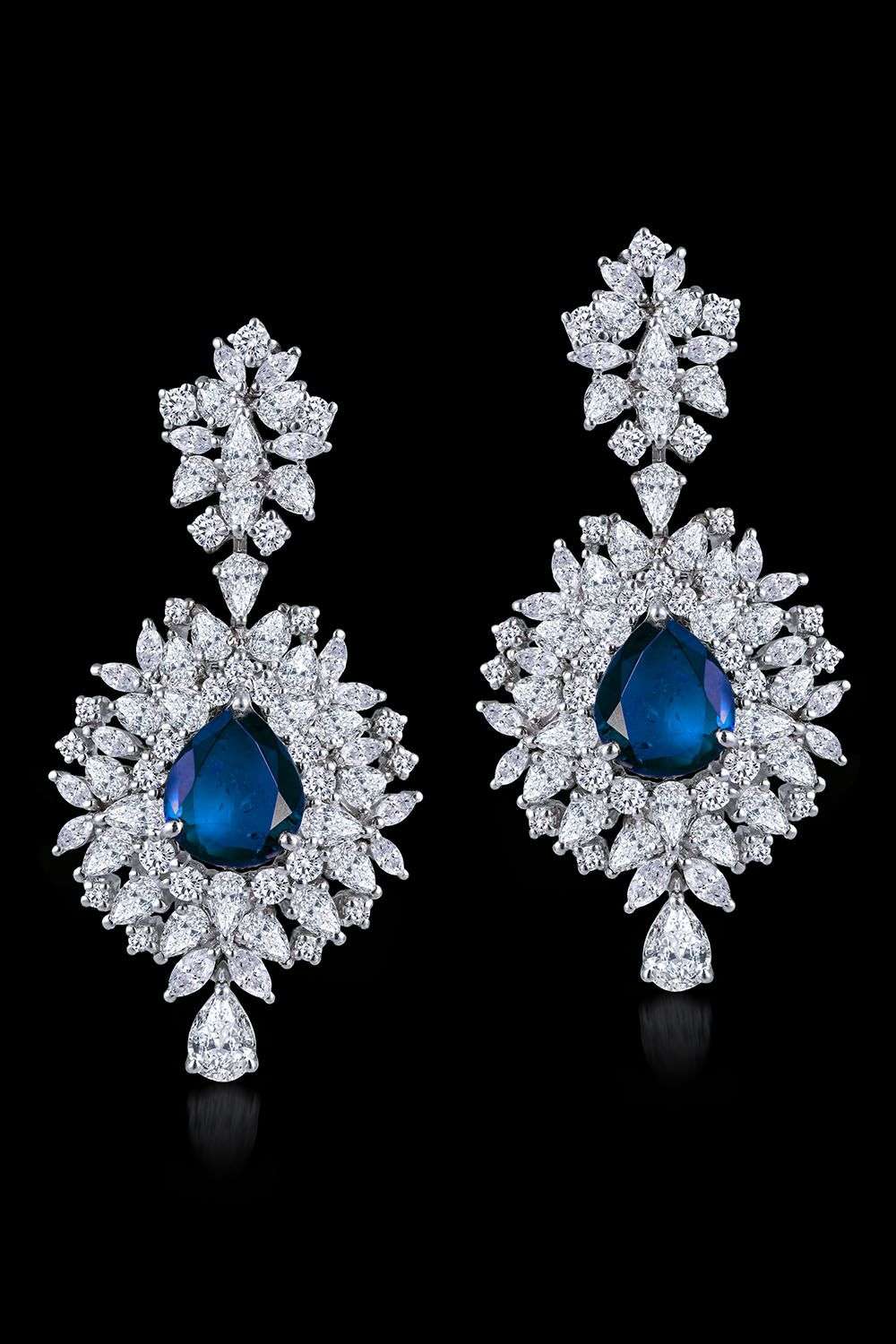 Buy White Embellished Pear And Marquise Swarovski Zirconia Earrings by  DIOSA PARIS JEWELLERY Online at Aza Fashions.