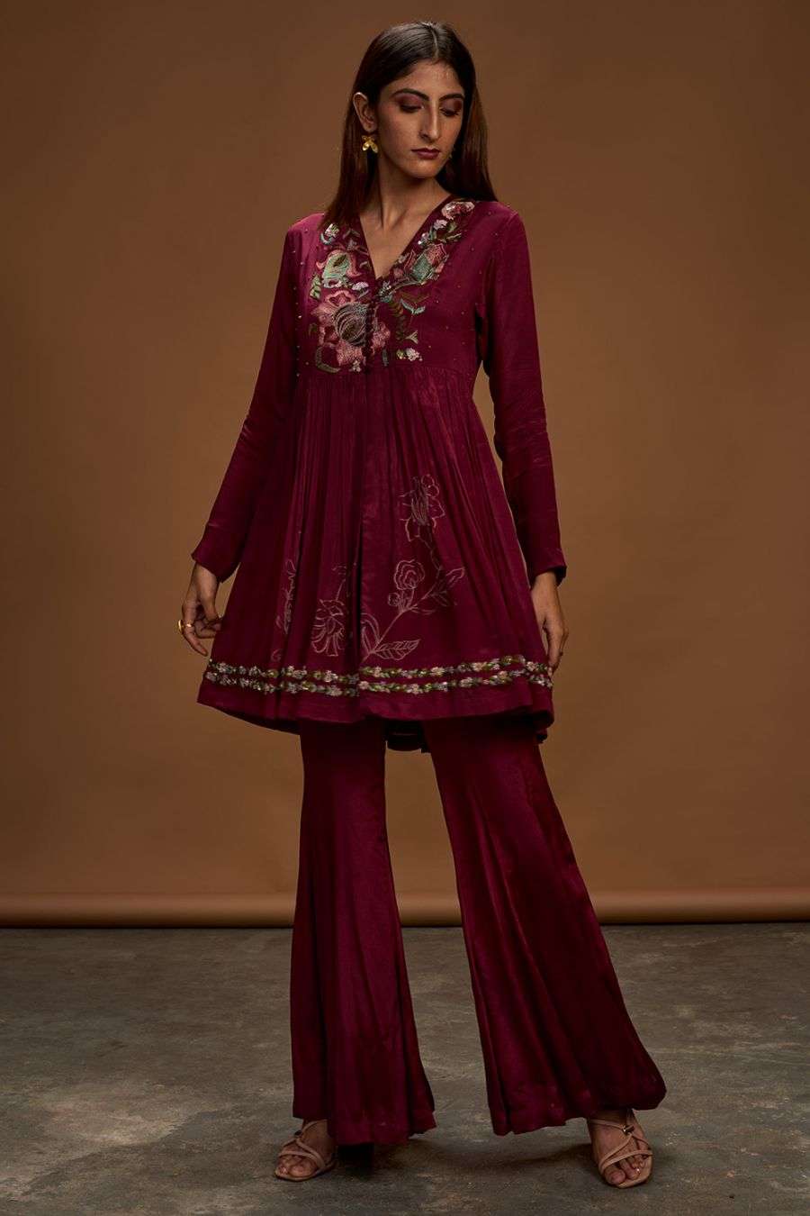 peplum top with bell bottom